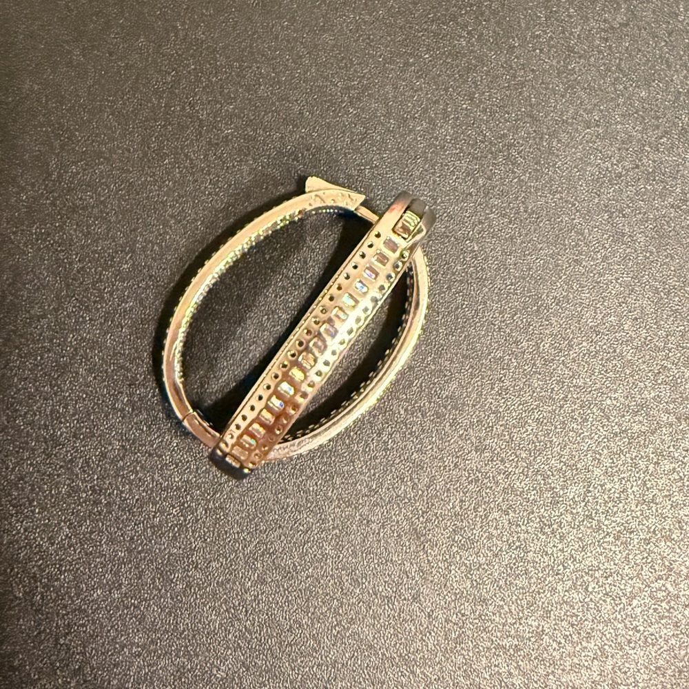 Elegant – These sparkling hoop earrings have a refined and sophisticated look. - Picture 8 of 14